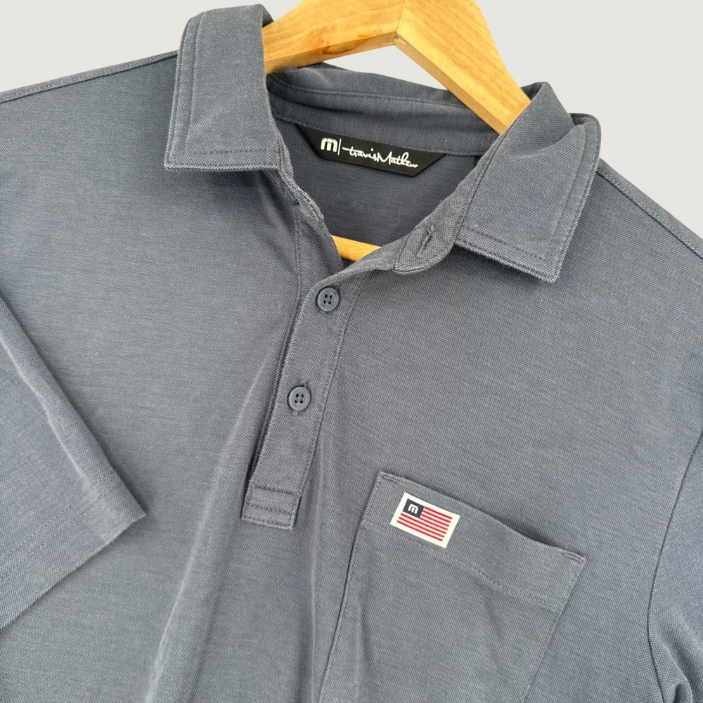 TravisMathew Mens Small  Short Sleeve Pocket Polo Shirt Blue American Flag Patch